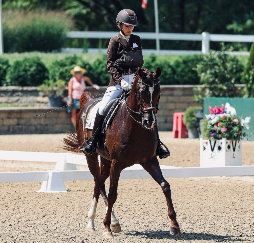 Elle Woolley competing in para dressage on horseback